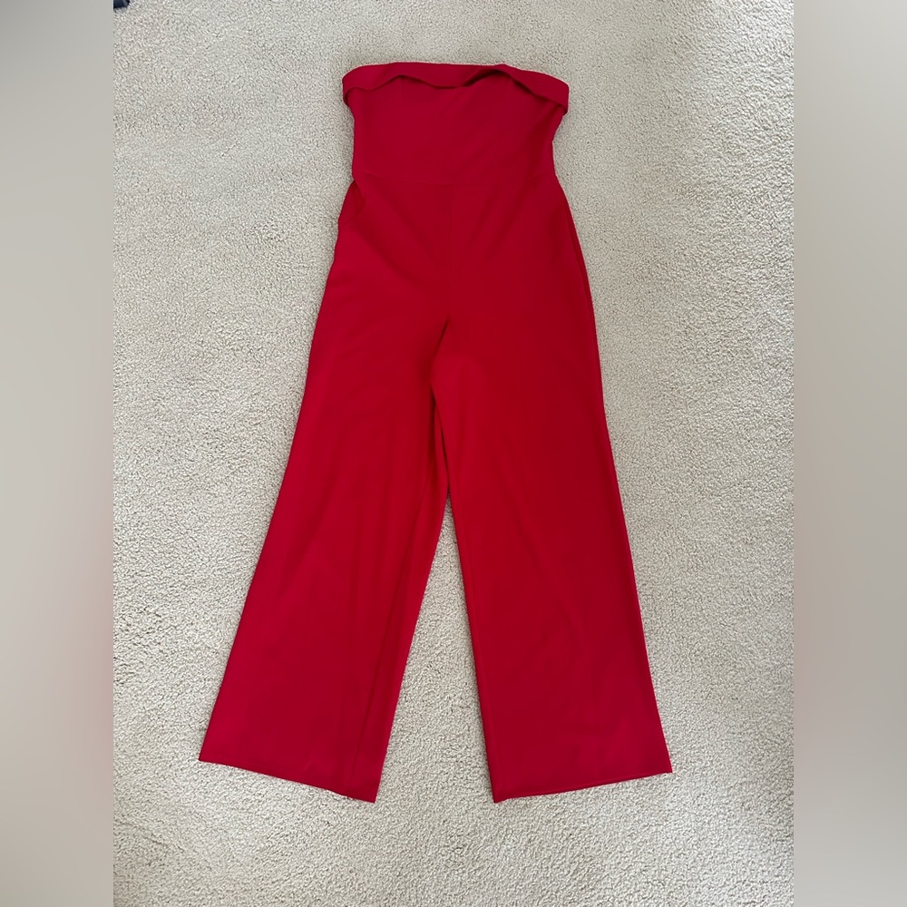 Never worn with tag Crystal Sky strapless Red jumpsuit Size L